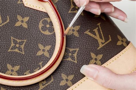 lv wallet button lose repair|louis vuitton repairs cost.